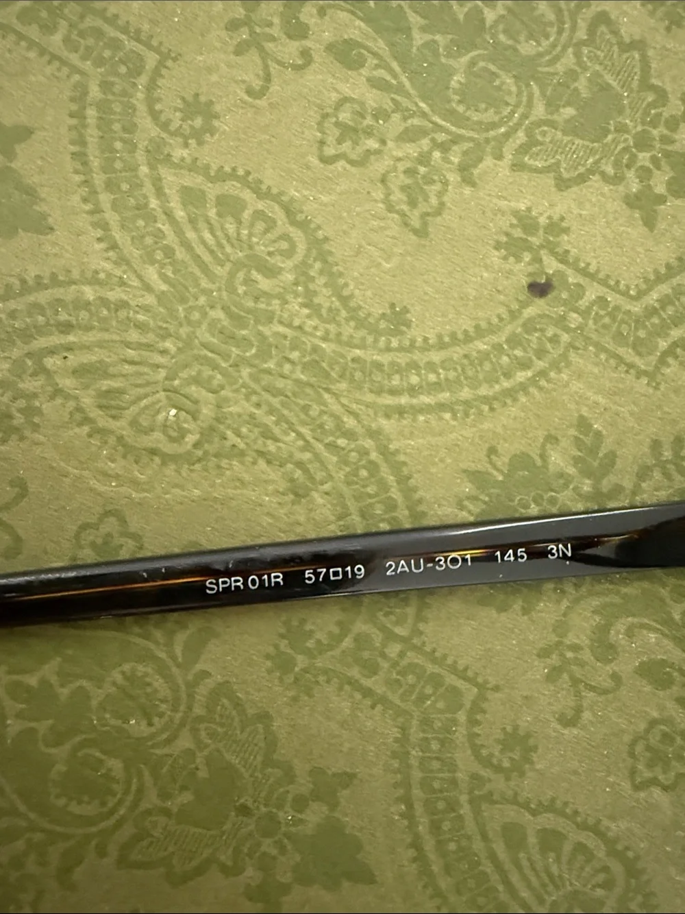 Prada Tortoiseshell Frame Sunglasses with Dark Green Lenses